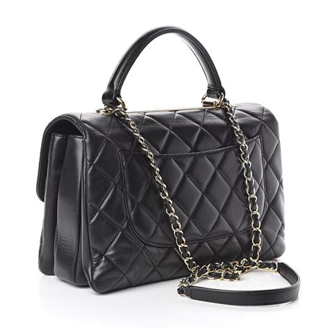 chanel quilted black leather pumps with pouch|Chanel lambskin bag.